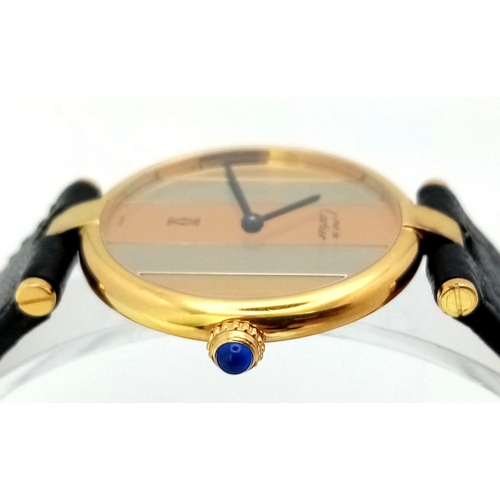 46 - A Cartier Must De Vermeil Tri Colour Unisex Watch. Black leather strap. Vermeil case - 32mm, with al... 