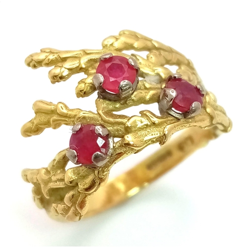 142 - A Vintage 18K Yellow Gold and Ruby Ring. Foilage decoration with three rubies. Size K. 4.3g total we... 