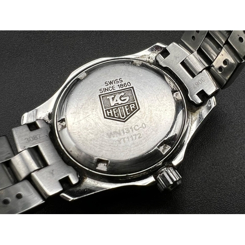 128 - A Tag Heuer Professional Ladies Diver Quartz Watch. Stainless steel bracelet and case - 28mm. Silver... 