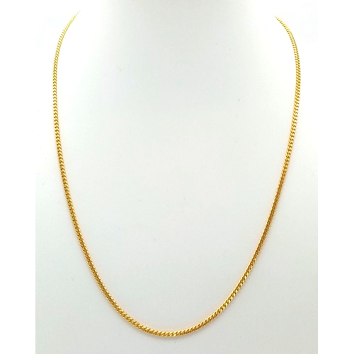 9 - A 22k Yellow Gold Flat Curb Link Necklace. 44cm. 9.35g