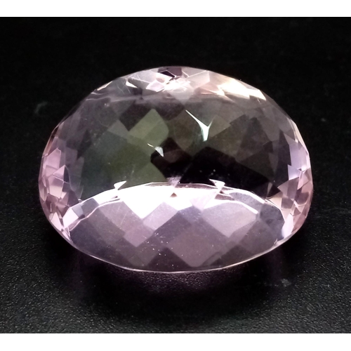 153 - A glorious, large (100.50 carats) pink Morganite. Oval cut, lab created, uniform soft pink colourati... 