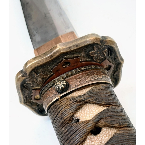 83 - WW2 Japanese Officers Sword with an ancient family blade. The sword is in an Nco’s metal scabbard. I... 