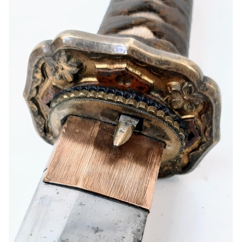 83 - WW2 Japanese Officers Sword with an ancient family blade. The sword is in an Nco’s metal scabbard. I... 