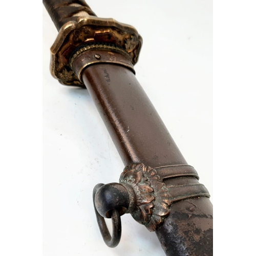 83 - WW2 Japanese Officers Sword with an ancient family blade. The sword is in an Nco’s metal scabbard. I... 