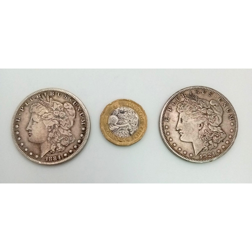 123 - Two Silver USA Morgan Dollars - 1884 and 1921 - S. Please see photos for conditions.