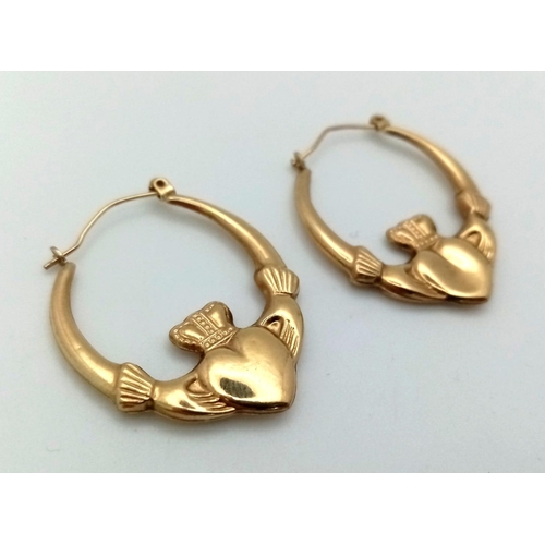 1615 - A Pair of Vintage 9K Yellow Gold Claddagh Hoop Earrings.
1.75g total weight.