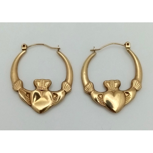 1615 - A Pair of Vintage 9K Yellow Gold Claddagh Hoop Earrings.
1.75g total weight.