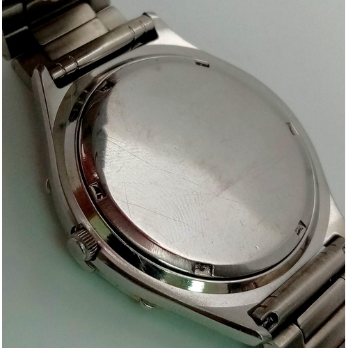 94 - A Rare Vintage Rado 990 Automatic Gents Watch. Stainless steel strap and case - 35mm. Silver tone di... 