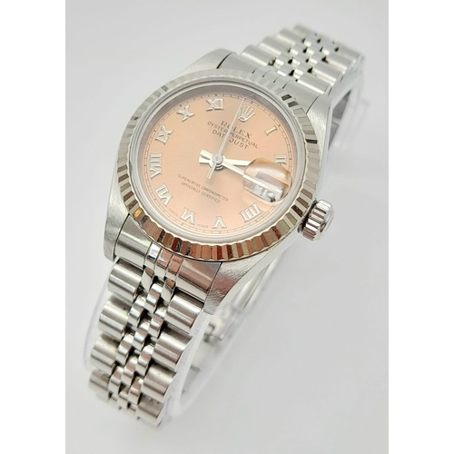 60 - A Rolex Perpetual Datejust Ladies Watch. Stainless steel strap and case - 26mm. Rose gold tone dial.... 