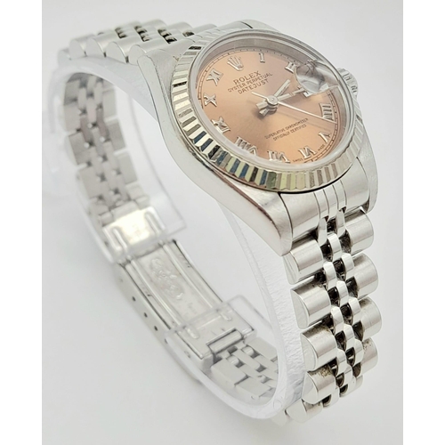 60 - A Rolex Perpetual Datejust Ladies Watch. Stainless steel strap and case - 26mm. Rose gold tone dial.... 