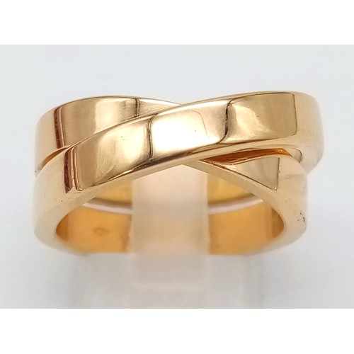 36 - CARTIER 18K YELLOW GOLD CROSS OVER RING WITH ORIGINAL PAPERWORK, WEIGHT 15.1G SIZE O