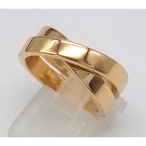 36 - CARTIER 18K YELLOW GOLD CROSS OVER RING WITH ORIGINAL PAPERWORK, WEIGHT 15.1G SIZE O