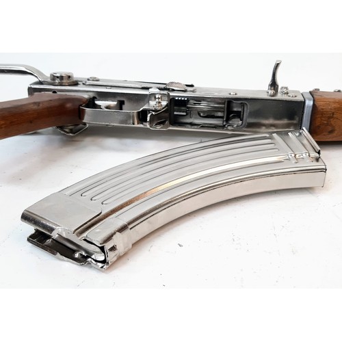 157 - Lord of War 2! A Silver-Plated Deactivated AK47 Rifle! This model 56-1 AK47 has a clean silver/chrom... 