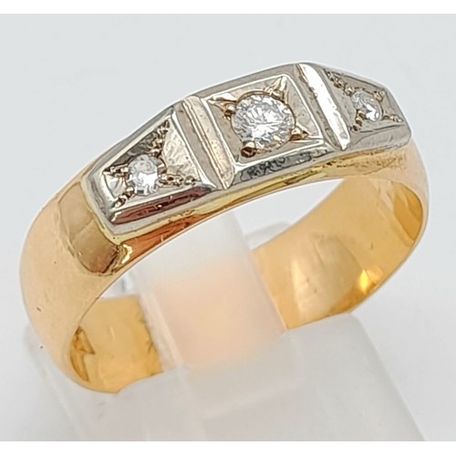 135 - A Vintage 18K Gold and Diamond Trilogy Ring. Three brilliant round cut diamonds of approx 1ctw creat... 