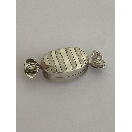 119 - Vintage Rare and unusual SILVER PILL BOX in the form of a wrapped toffee. Having full UK hallmark.