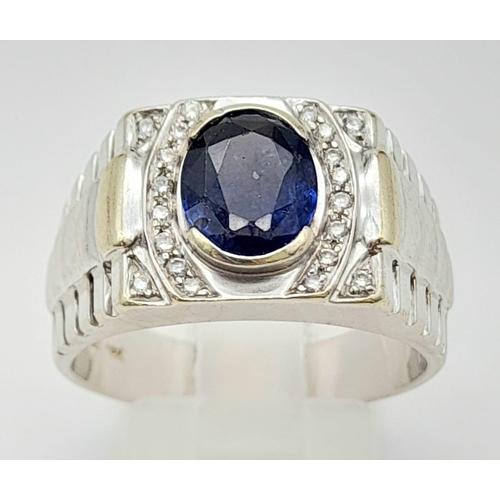 54 - An 18K white gold ring, ROLEX style, with an oval cut sapphire (1.70 carats). ring size: S1/2, weigh... 