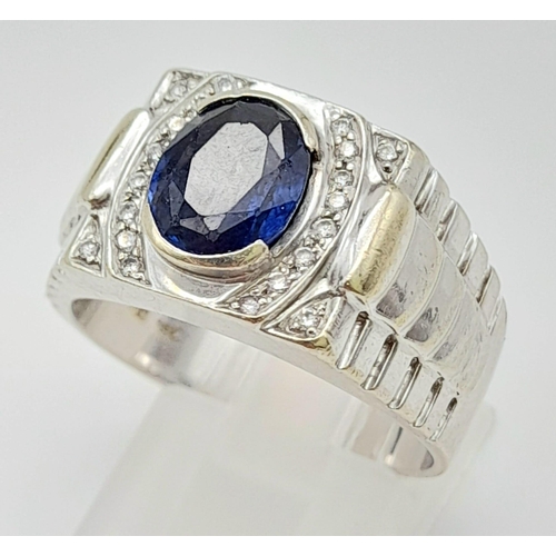 54 - An 18K white gold ring, ROLEX style, with an oval cut sapphire (1.70 carats). ring size: S1/2, weigh... 