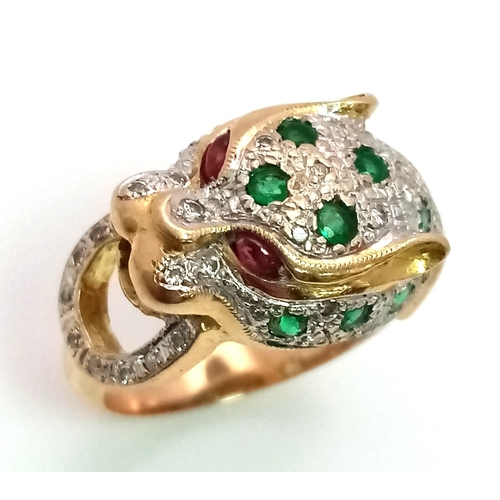 61 - An 18 k yellow gold Panther ring with diamonds and emeralds and two ruby eyes. Ring size: K, weight:... 