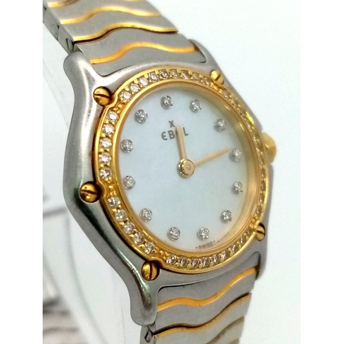 71 - An Ebel Ladies Wave Mother of Pearl Quartz Watch. Two-tone bracelet (24k gold electroplated waves) a... 