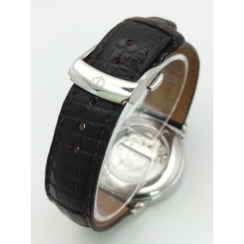 78 - A Baume and Mercier Automatic Gents Watch. Original leather strap. Stainless steel case with skeleto... 