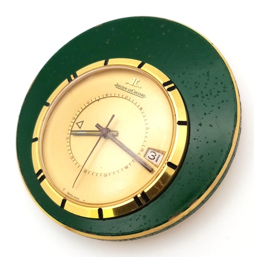 85 - A Vintage Jaeger le Coultre Travel Alarm Clock. Green enamel outer. Gilded dial with date window. 47... 