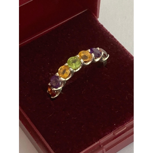 98 - Multi Gemstone SILVER RING, having AMETHYST, GARNET, PERIDOT and CITRINE Gemstones mounted to top in... 