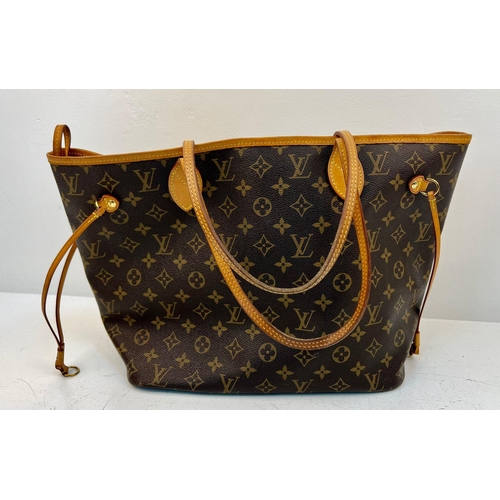 67 - A Louis Vuitton Neverfull Tote Bag And LV Pouch! Brown monogram canvas exterior with leather handles... 