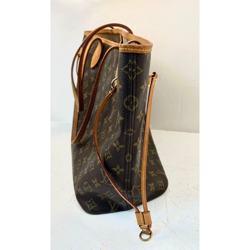 67 - A Louis Vuitton Neverfull Tote Bag And LV Pouch! Brown monogram canvas exterior with leather handles... 