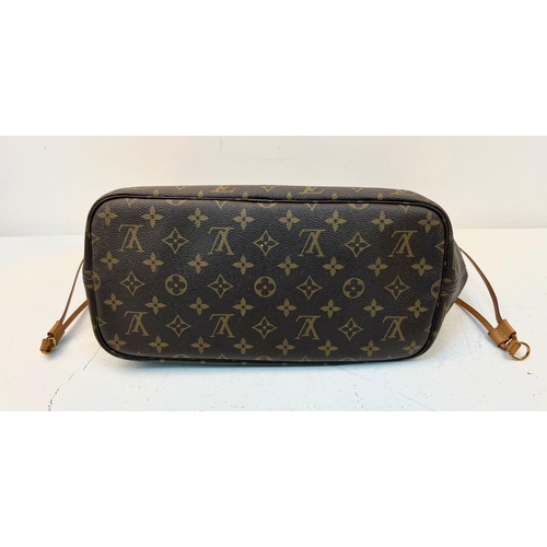 67 - A Louis Vuitton Neverfull Tote Bag And LV Pouch! Brown monogram canvas exterior with leather handles... 