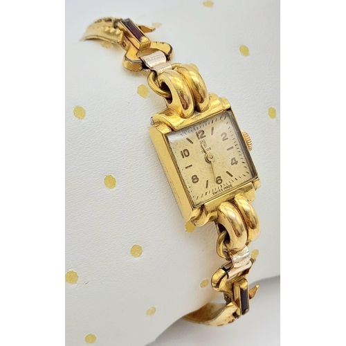 86 - A Vintage Tudor (Rolex) Ladies Watch. Gold plated bracelet. Small rectangular case - 16 x 22mm. Whit... 