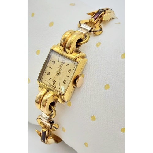 86 - A Vintage Tudor (Rolex) Ladies Watch. Gold plated bracelet. Small rectangular case - 16 x 22mm. Whit... 