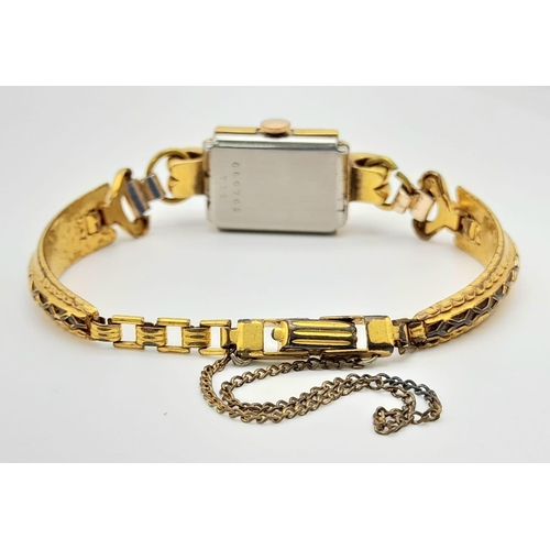 86 - A Vintage Tudor (Rolex) Ladies Watch. Gold plated bracelet. Small rectangular case - 16 x 22mm. Whit... 