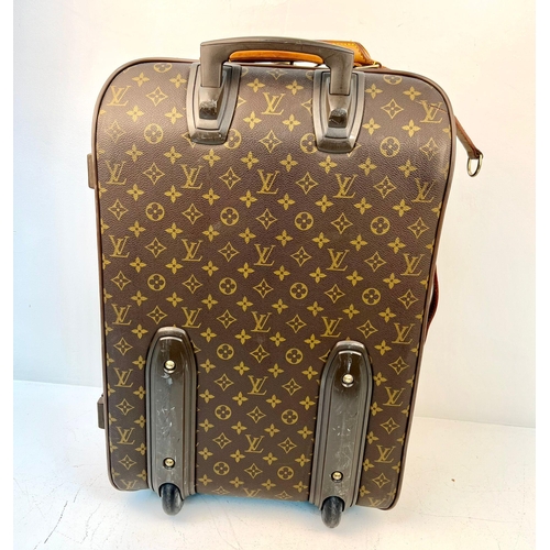 108 - A Louis Vuitton Pegase Trolley Cabin Suitcase. Monogram LV canvas exterior with large open pocket. L... 