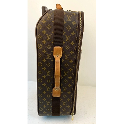 108 - A Louis Vuitton Pegase Trolley Cabin Suitcase. Monogram LV canvas exterior with large open pocket. L... 