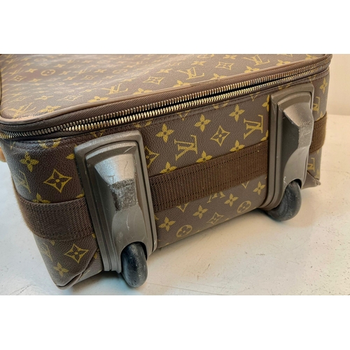 108 - A Louis Vuitton Pegase Trolley Cabin Suitcase. Monogram LV canvas exterior with large open pocket. L... 