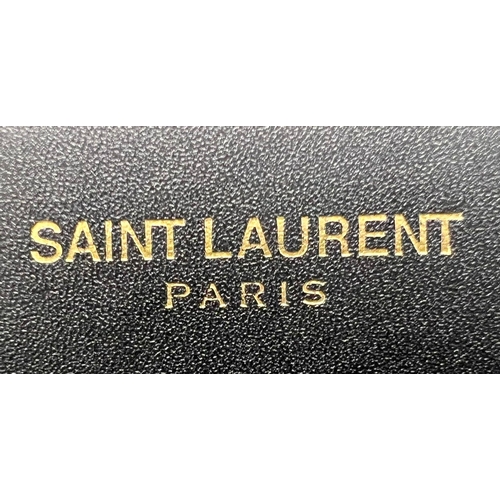 141 - A Yves Saint Laurent (YSL) Black Leather Shoulder/Cross-body Bag. Adjustable shoulder strap. Gold-to... 