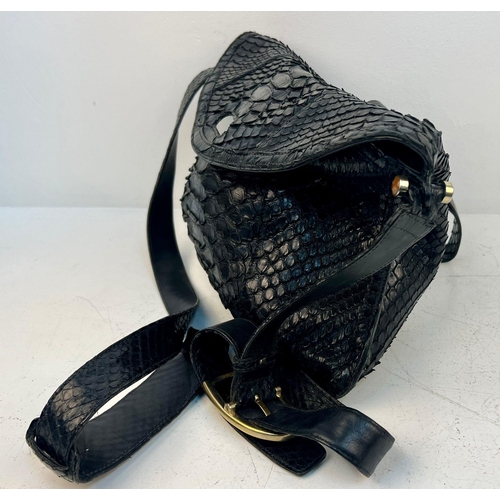 164 - A Gucci Black Python/Snakeskin Shoulder Bag. Gold-tone hardware. Adjustable shoulder strap. Spacious... 