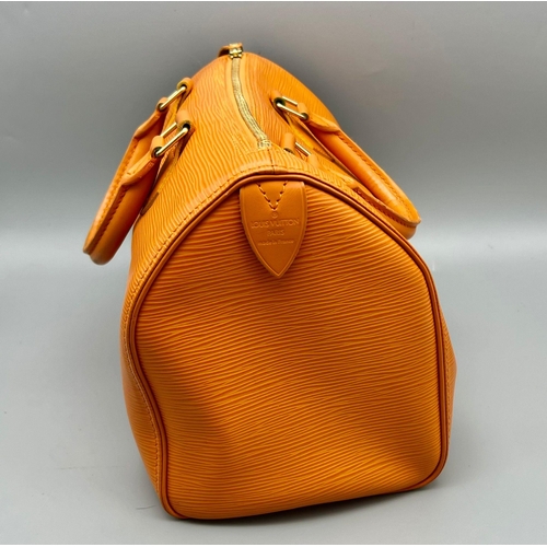 177 - A Louis Vuitton Mandarin Epi Leather Speedy Bag. Twin handles with a zipped top. Orange textile inte... 