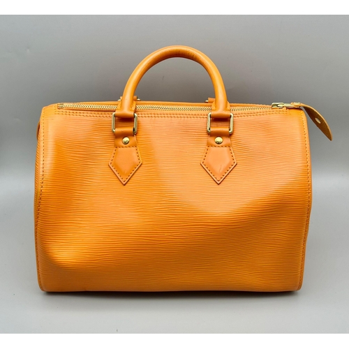 177 - A Louis Vuitton Mandarin Epi Leather Speedy Bag. Twin handles with a zipped top. Orange textile inte... 