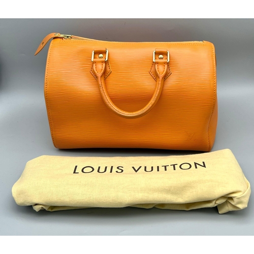 177 - A Louis Vuitton Mandarin Epi Leather Speedy Bag. Twin handles with a zipped top. Orange textile inte... 