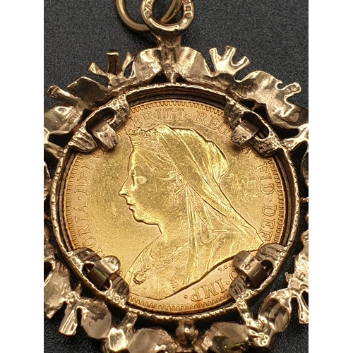 33 - 22k yellow gold full Sovereign coin with Queen Victoria dated 1900, set into a 9ct yellow gold flora... 