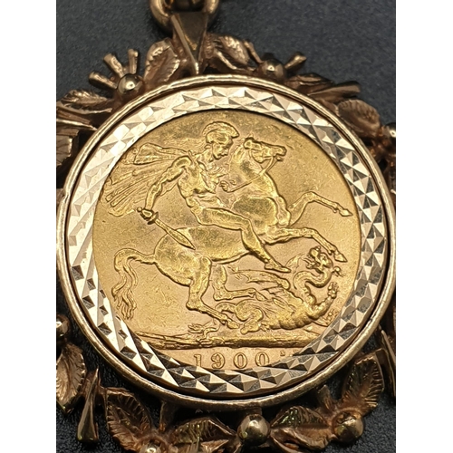 33 - 22k yellow gold full Sovereign coin with Queen Victoria dated 1900, set into a 9ct yellow gold flora... 