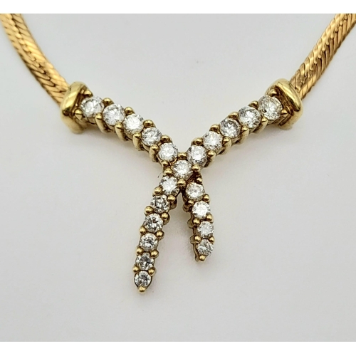 148 - An 18 k yellow gold, diamond (0.45 carats) set chain necklace. Length: 41 cm, weight: 5.4 g.