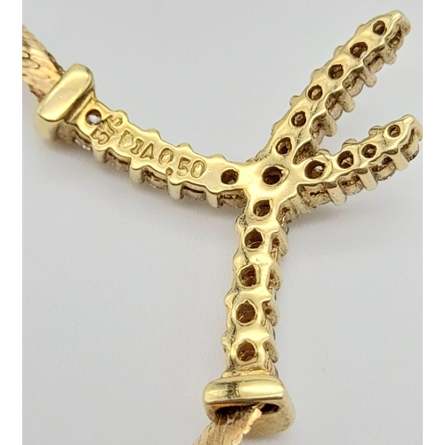 148 - An 18 k yellow gold, diamond (0.45 carats) set chain necklace. Length: 41 cm, weight: 5.4 g.