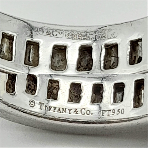 38 - A Tiffany and Co Platinum and Diamond Full Eternity Ring. 950 platinum with full circle of high qual... 