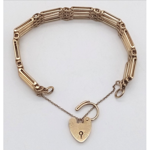 88 - A Lovely Vintage 9K Yellow Gold Gate Bracelet with Heart Clasp. 18cm. 27.6g. Comes in a presentation... 