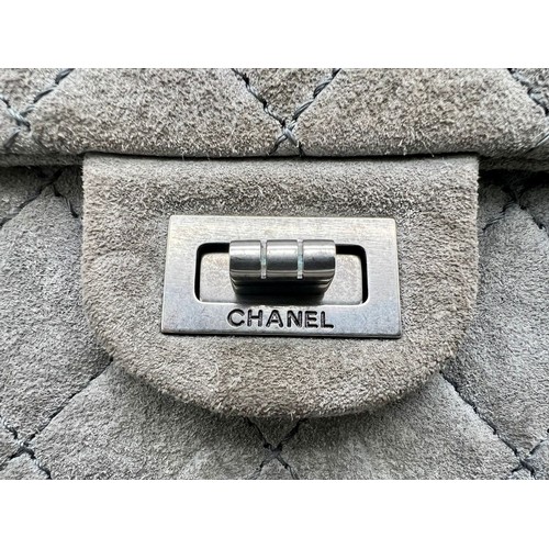 11 - A Classic Chanel Grey Suede Quilted Large Shoulder Flap Bag. Quilted soft suede exterior (worn). Gre... 