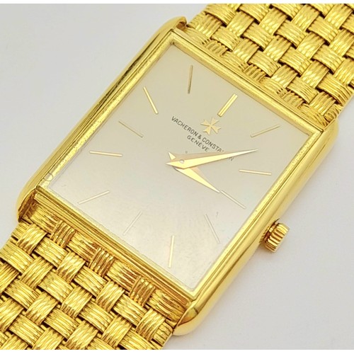 52 - A Vacheron and Constantin 18K Gold Dress Watch. 18K gold bracelet and case - 23mm x 29mm. Champagne ... 