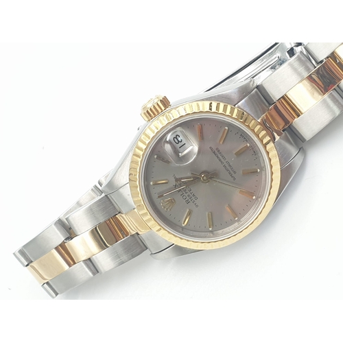 158 - A Rolex Oyster Perpetual Datejust Ladies Watch. Bi-metal strap and case - 26mm. Silver-tone dial. Au... 