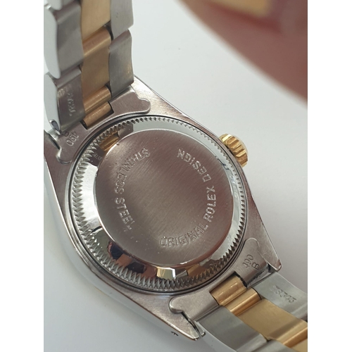 158 - A Rolex Oyster Perpetual Datejust Ladies Watch. Bi-metal strap and case - 26mm. Silver-tone dial. Au... 